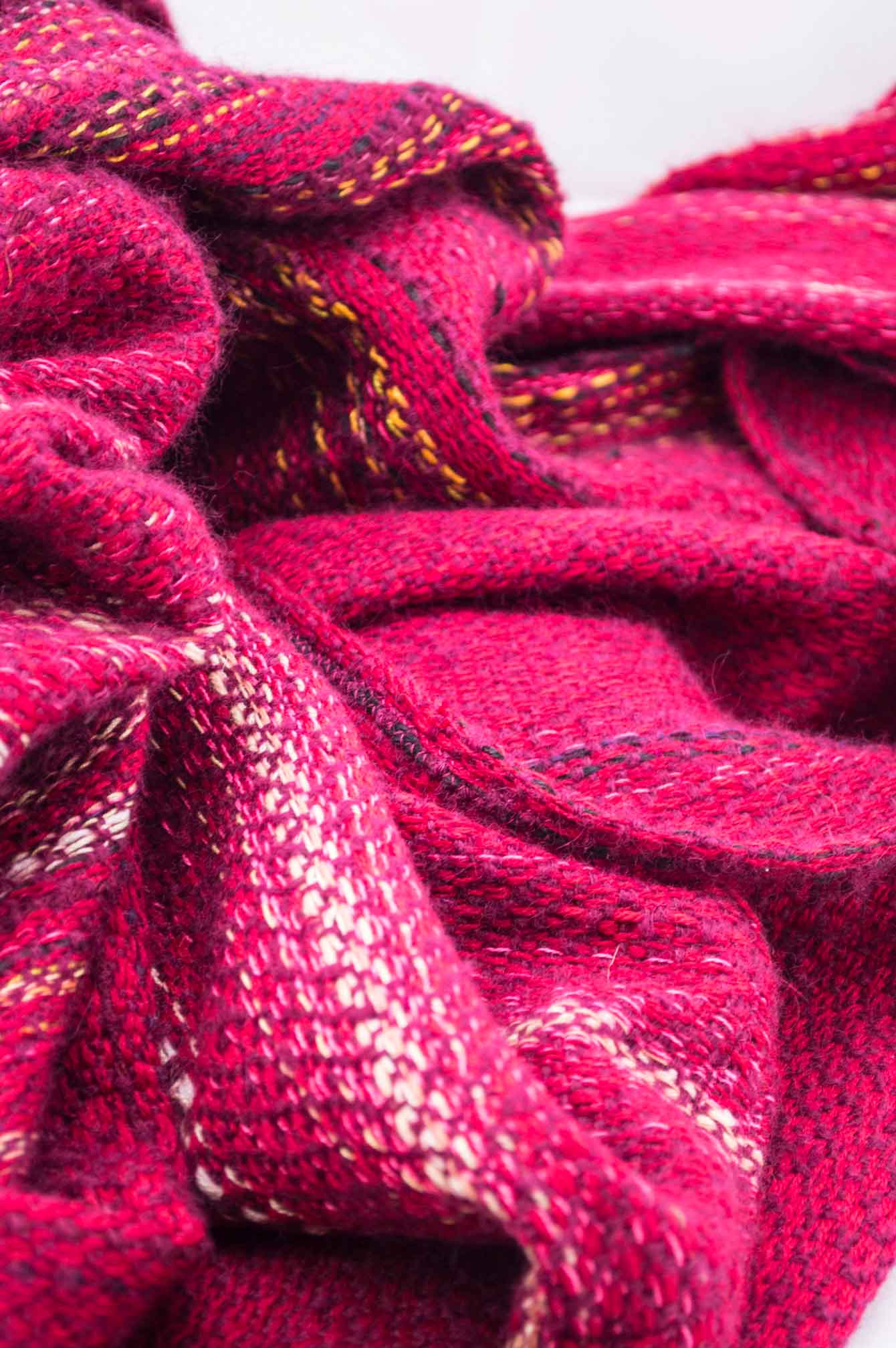 Throw blanket created with violet mohair, cashmere, red wool, cotton, and linen.   Technique: Throw blanket hand-woven in a traditional way on non-mechanical looms in the 7th arrondissement of Paris in France.  Finishes: Right edge. Double stitching.  Size: 150 x 180 cm.  Single piece / 1 copy only.