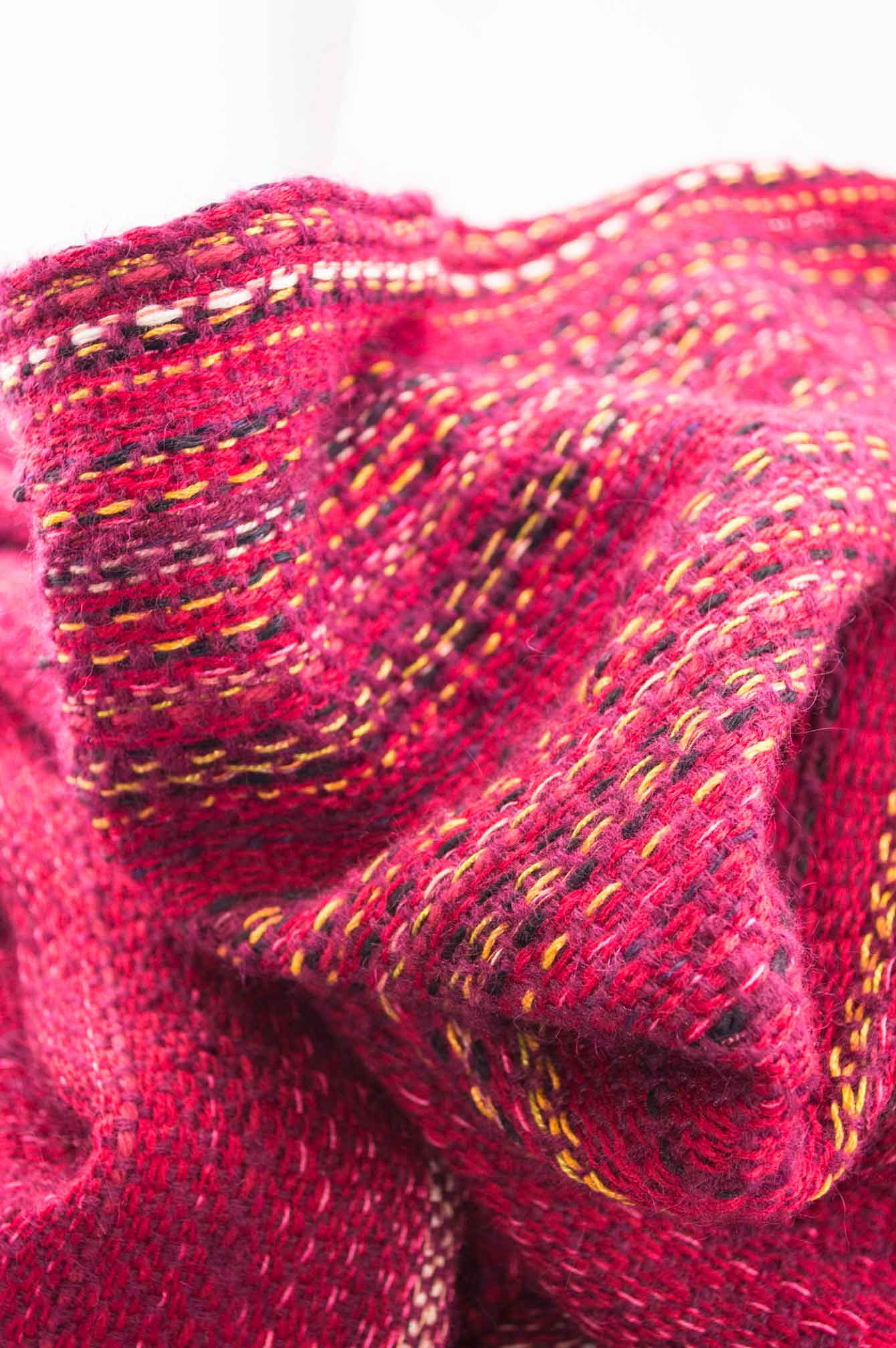 Throw blanket created with violet mohair, cashmere, wool, cotton, and linen.   Technique: Throw blanket hand-woven in a traditional way on non-mechanical looms in the 7th arrondissement of Paris in France.  Finishes: Right edge. Double stitching. 2 edges with 9 cm wool fringes.  Size: 150 x 235 cm.  Single piece / 1 copy only.